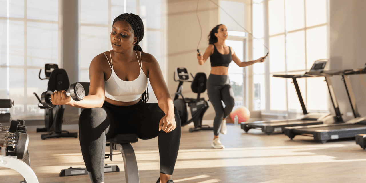 a person exercising at a gym