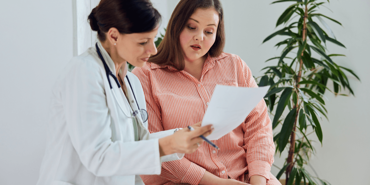 a healthcare professional with a patient