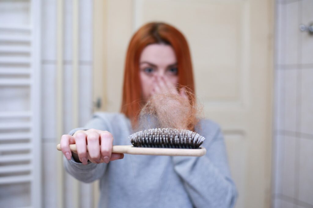 a women losing her hair