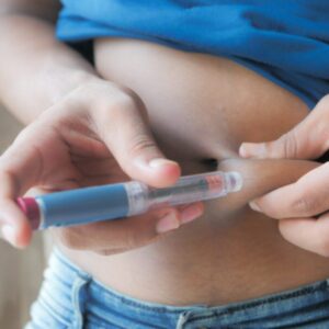 a woman injecting wegovy 7.2mg into her belly